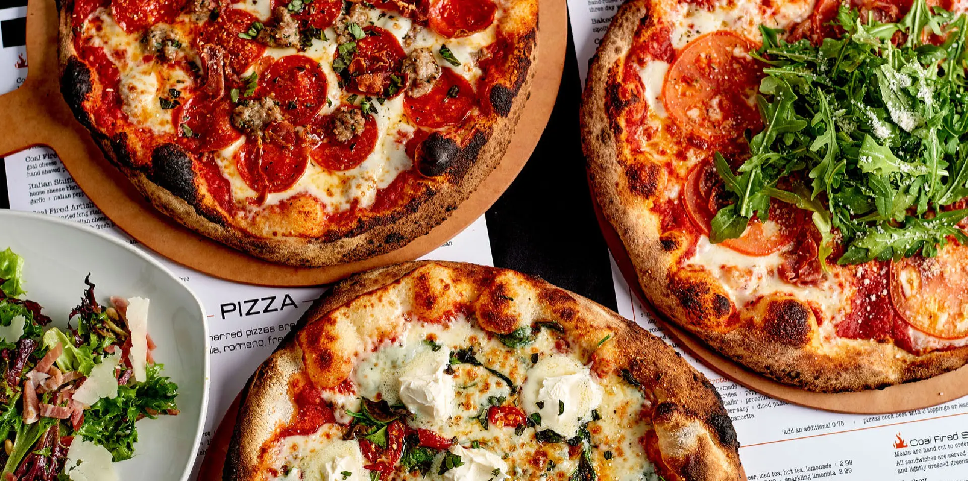 SLYCE-header-1920x955-72ppi Three delicious coal fired pizzas representing the cohesive brand umbrella we helped them create