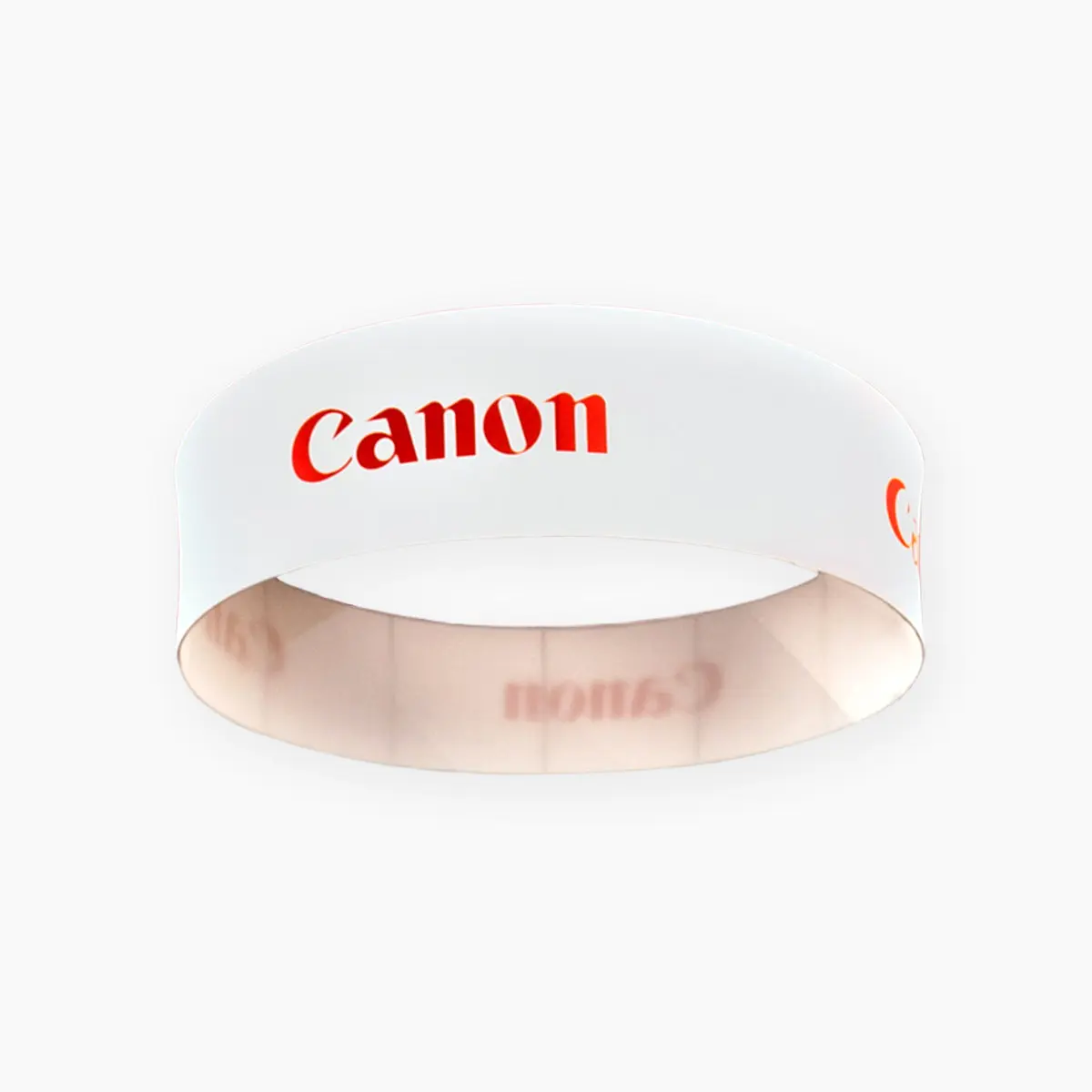 A hanging tradeshow display in white with Canon logo in red created for a major printing exposition.