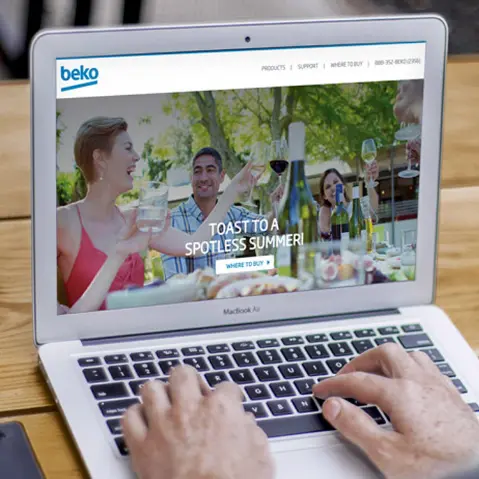 The dynamic Beko website we created for the brand shown on a laptop screen.