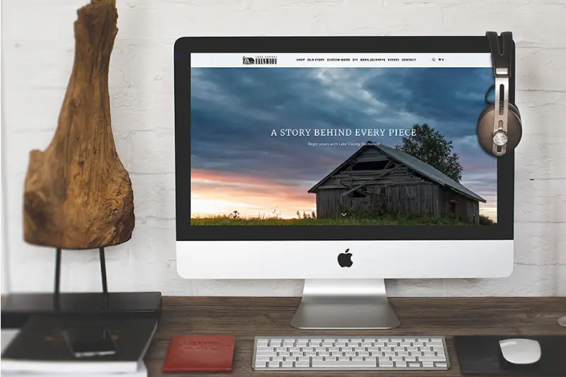 Dramatic barn at sunrise introduces the Lake County Barnwood story on the homepage.