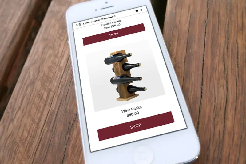 A phone showing the e-commerce capabilities we built into the Lake County Barnwood website.