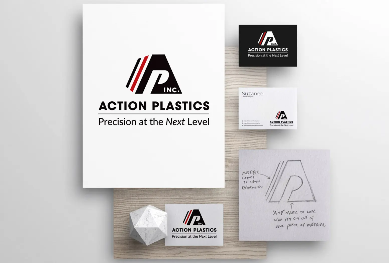 Pencil sketch and finished variations of the new logo we designed for Action Plastics.