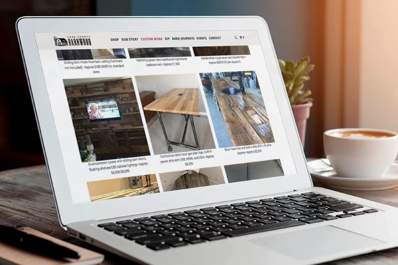 lakeCountyBarnwood-laptop-800x533-72ppi laptop sits on a table next to a cup of coffee, displays the for sale items on Lake County Barnwood site