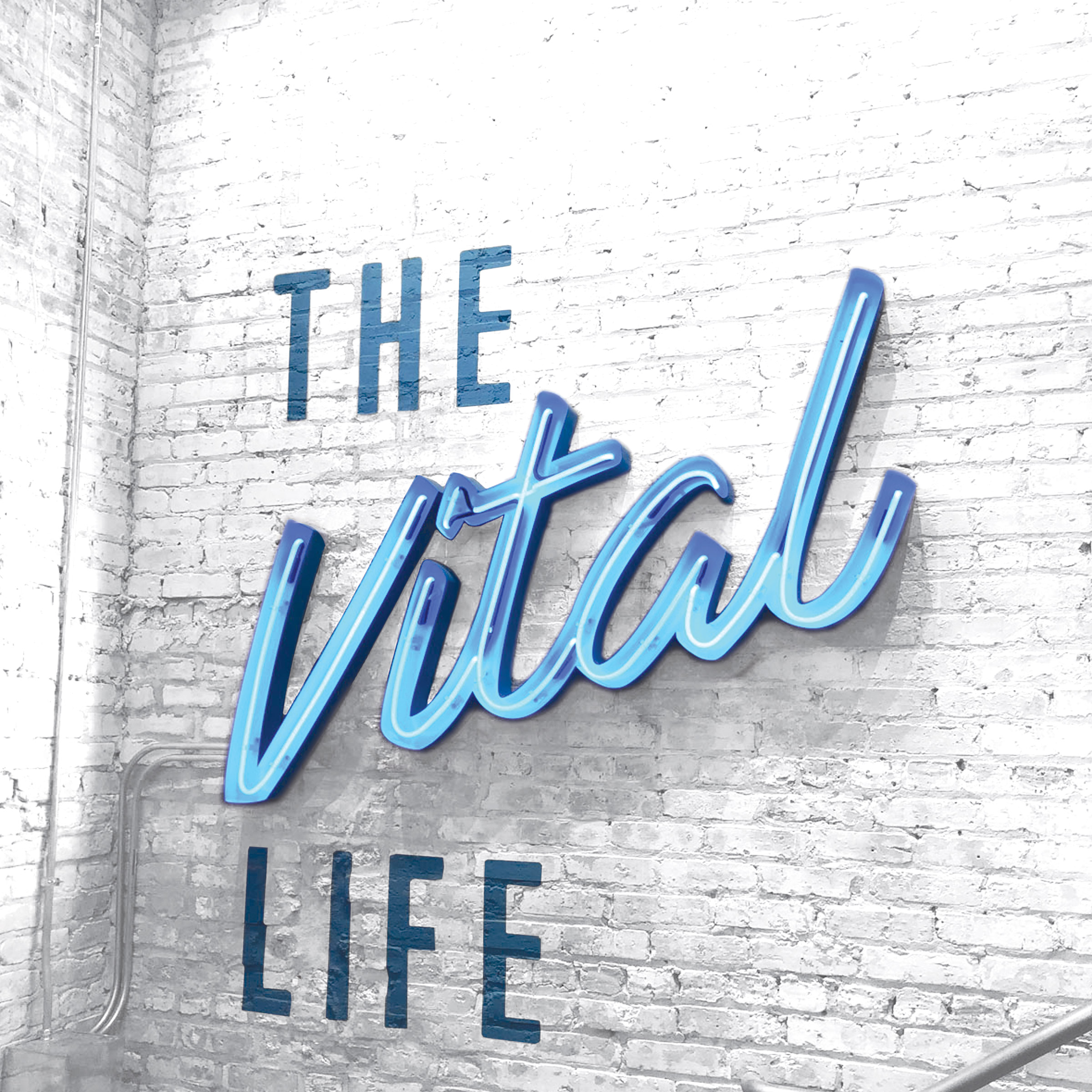 vinyl sign that reads The Vital Life