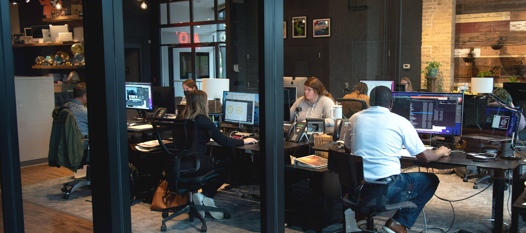image of workers at their desks