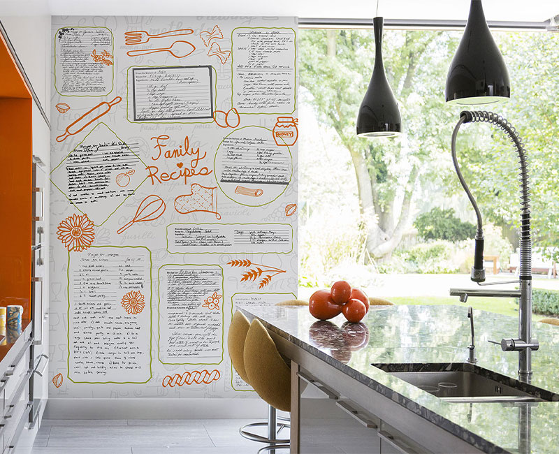 a kitchen with custom wallpaper with recipes and cooking utensils