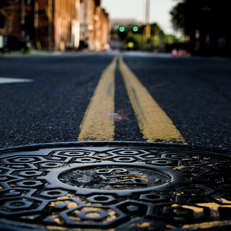 about_manhole_800x800 image manhole cover on street