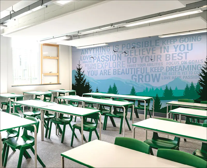 Classroom with desks and a wallpaper mural with a nature landscape custom wallpaper for branding environments